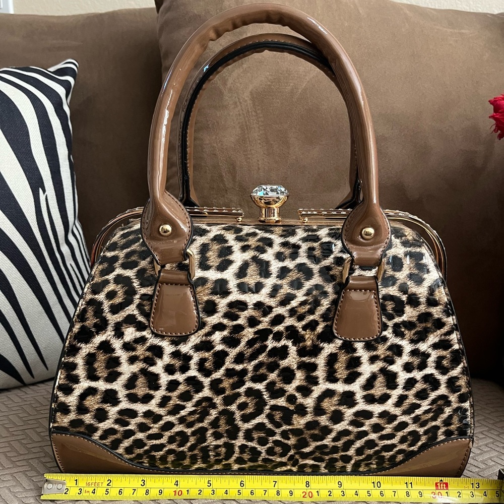 Patent leather structured handbag leopard print